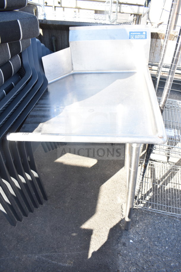 Commercial right side clean side dishwasher table, stainless steel, used. Features raised edging. Label visible.