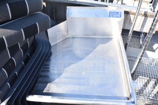Commercial right side clean side dishwasher table in stainless steel, used condition, with visible NSF certification label.