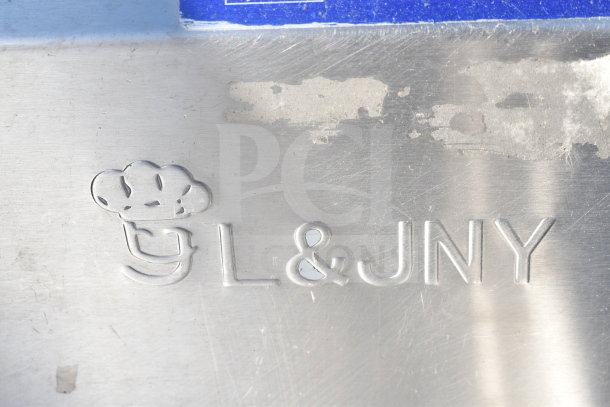 Commercial Right Side Clean Side Dishwasher Table with L&JNY logo in embossed metal, silver finish, durable condition.