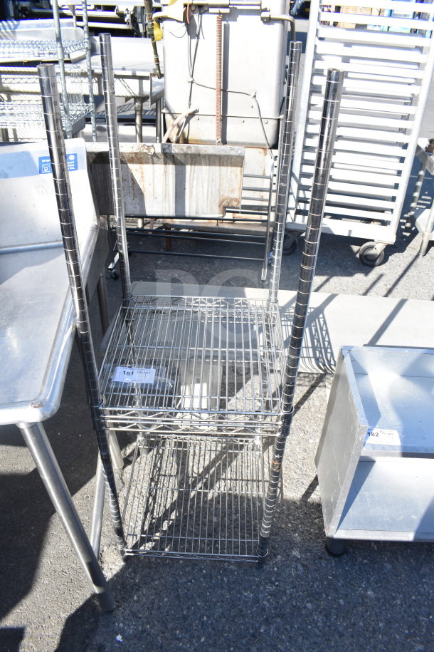Chrome finish 3 tier shelving unit with wire shelves. Requires dismantling by buyer. Measures approximately 18 x 36 inches.