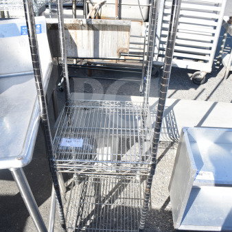 Chrome finish 3 tier shelving unit with wire shelves. Requires dismantling by buyer. Measures approximately 18 x 36 inches.