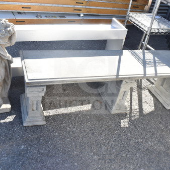 Concrete bench and child statue set, includes detailed classic design; both in good condition for outdoor decor.