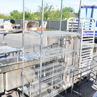 Chrome finish 6-tier wire shelving unit in good condition. Note: Buyer must dismantle and consider freight charges.