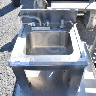 Stainless steel single bay sink with faucet, good condition, auction tag 190.