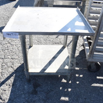 Commercial equipment stand with under shelf, metal, slightly worn, label marked "191". Ideal for kitchen use.