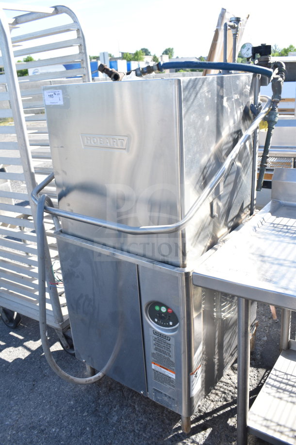 Hobart AM18 commercial pass-through dishwasher, stainless steel, 208-240V, 3-phase, control panel and label visible, gently used.