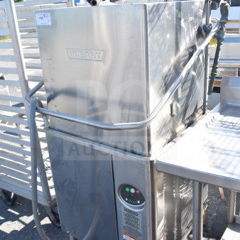 Hobart AM18 commercial pass-through dishwasher, stainless steel, 208-240V, 3-phase, control panel and label visible, gently used.