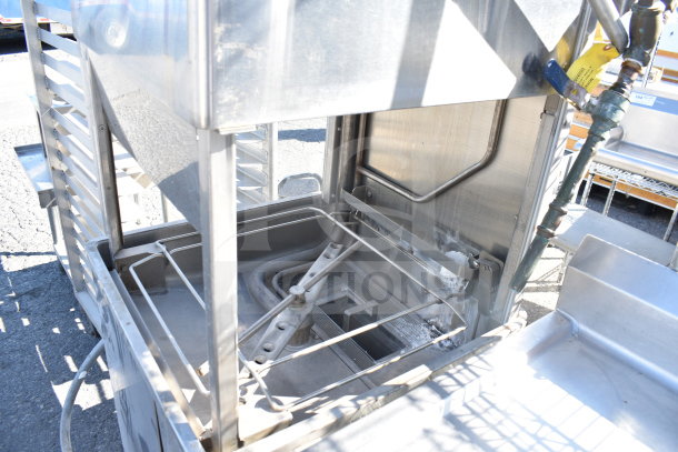 Hobart AM18 commercial pass-through dishwasher. Stainless steel, visible interior, 208-240V, 3 phase, used condition.