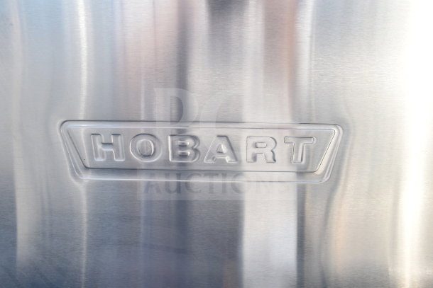 Hobart AM18 commercial dishwasher, stainless steel, logo detail. 208-240V, 3-phase. Pristine condition.