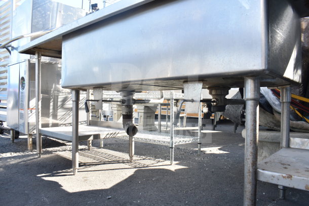 Commercial 2 Bay Sink with Dual Drain Boards, stainless steel, sturdy frame, used condition, under mount plumbing.