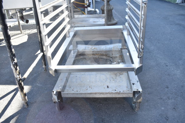 Commercial pan transport rack with casters for roll-in oven, stainless steel, used condition.