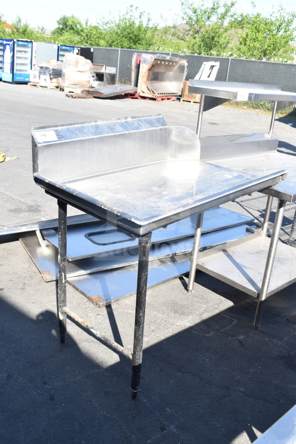 Commercial left side clean side dishwasher table, stainless steel, used condition, visible wear on legs, back splash included.