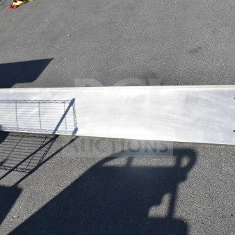 Stainless steel shelf, long rectangular shape, clean surface, four mounting holes visible, suitable for storage or display.