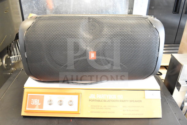 JBL PartyBox 110 portable Bluetooth speaker, powerful sound, dynamic light show, guitar/mic inputs, splash-proof.