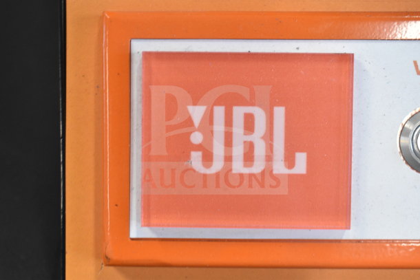 Orange JBL logo on PartyBox Bluetooth speaker box, indicating brand authenticity.