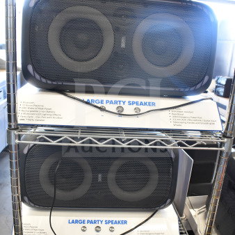 Two Onn Portable Bluetooth Speakers on shelves, featuring Bluetooth, 12-hour playtime, 640 watts power, LED effects, and IPX4 water resistance.