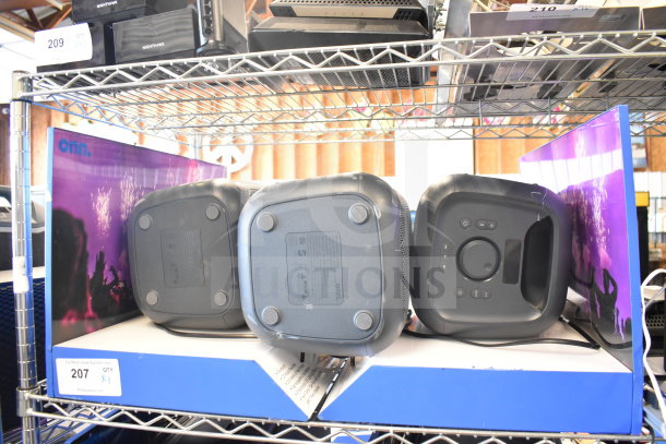 2 Onn Portable Bluetooth Speakers, gently used, with visible controls and branding. Auction label "207".