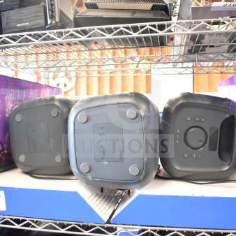 2 Onn Portable Bluetooth Speakers, gently used, with visible controls and branding. Auction label "207".