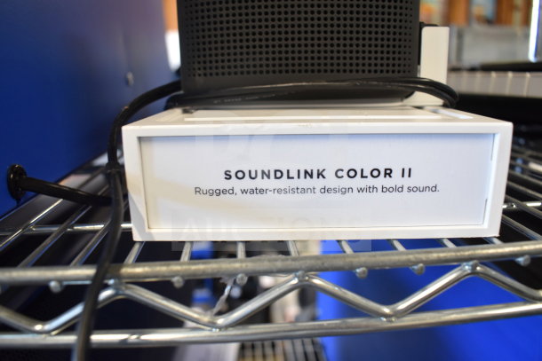 Bose SoundLink Color II speaker, black, water-resistant, rugged design, clear sound. Part of 8-item auction lot.