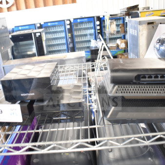 6 various items including Netgear Nighthawk router on metal shelf; routers include multiple Ethernet ports. Auction lot 209.