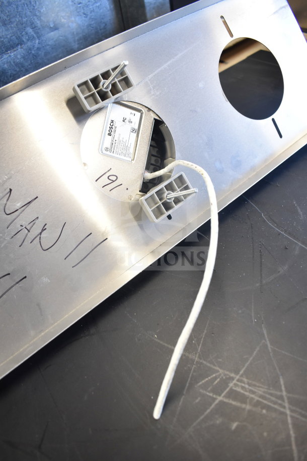 10 Bosch dome security cameras, unused. Metal mount with labeled Bosch unit. Markings include "191".
