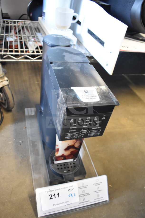 Chefman Single Cup Coffee Machine, black, featuring multiple brew size options. Slight wear visible, ideal for K-Cups. Auction lot 211.