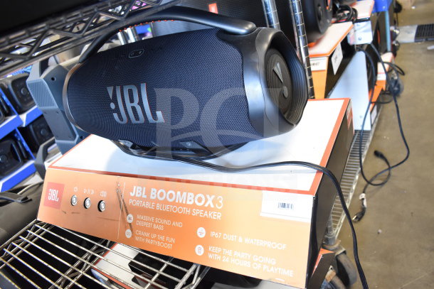 JBL Boombox 3 Portable Bluetooth Speaker on display box, featuring IP67 waterproof rating, massive sound, and 24-hour playtime.