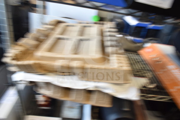 Blurry image of items on a shelf; specific features of the Acer C24B Series PC with keyboard are unclear.