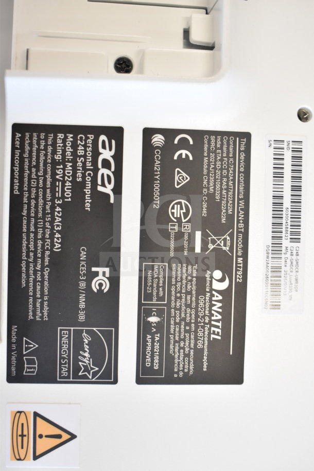 Acer C24B Series Personal Computer, Model MD24001, shown with labels indicating FCC compliance and ENERGY STAR rating.