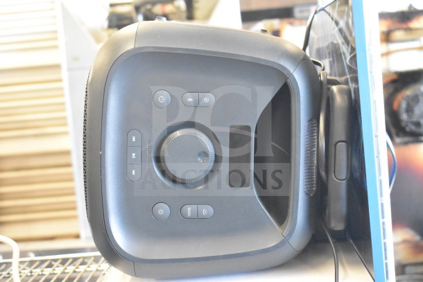 2 Onn large party speakers with controls for power, volume, play, and bass. Features a robust, portable design.