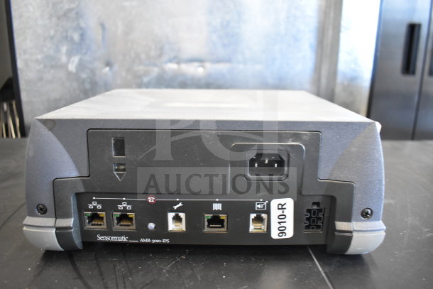 2 Sensormatic AMB-9010-IPS Deactivator Controllers, showing connection ports and "9010-R" label, in good condition.