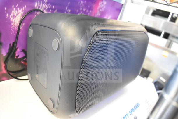 Samsung Speaker, Onn Medium Party Speaker; durable design, visible power cable, textured grille, lightly used condition.