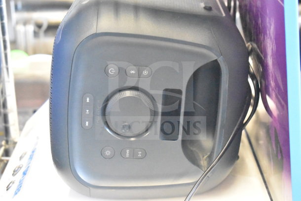 Samsung speaker with control panel and multiple buttons, showing power, input, and volume settings, in good condition.