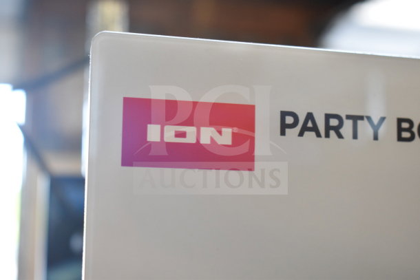 ION Party Boom Plus speaker label, highlighting brand name. Ideal for events, amplifying sound quality and volume.