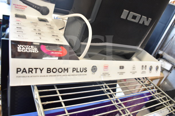2 Iron Party Boom Plus Speaker, featuring Bluetooth, multi-colored lights, rechargeable battery, and wide-range sound.