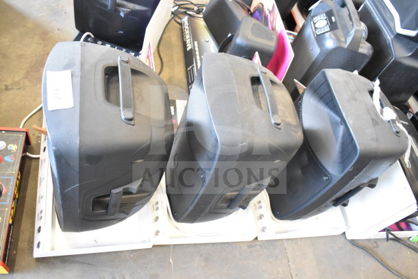 Three Ion Pro Glow Ultra speakers, black, with carry handles, in used condition. Auction lot number 209 visible.