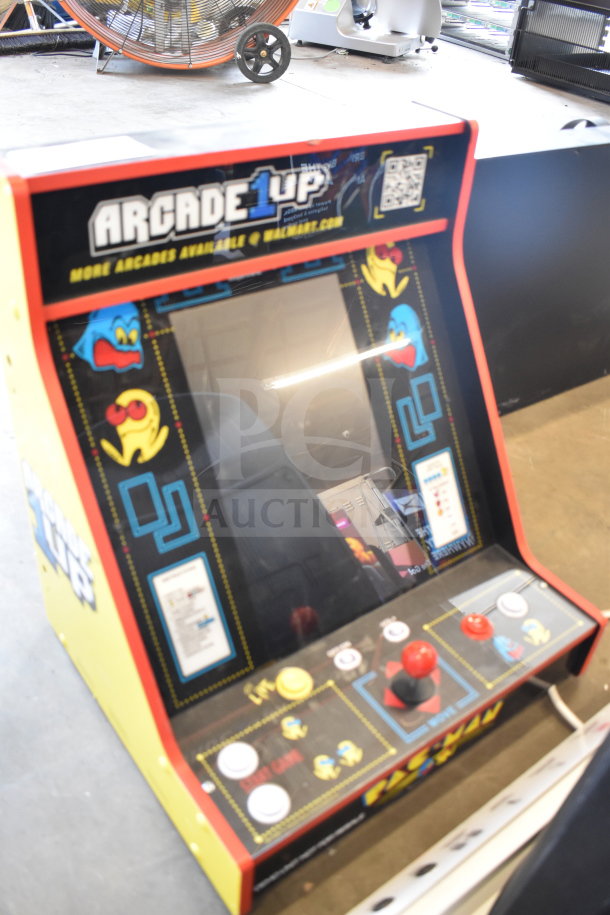 Arcade 1UP PAC-A-501030 Pac Man Machine, classic design, multicolor graphics, joystick controls, excellent condition.