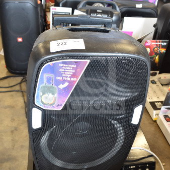 Altec Lansing IMT7002 speaker with retractable handle. Black, excellent condition, features wheeled mobility.