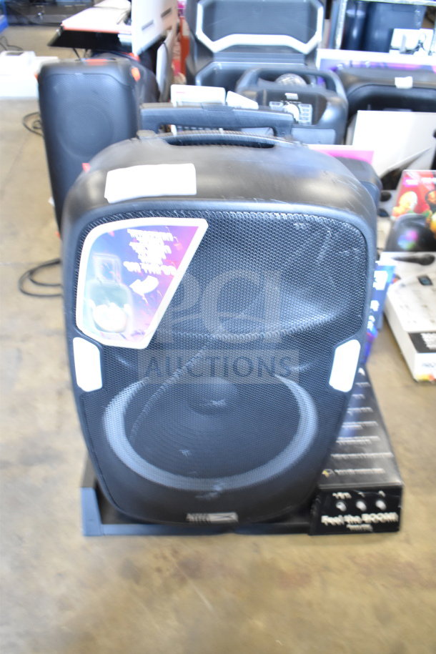 Altec Lansing IMT7002 Speaker in black, front view, mesh grille. Slight wear visible. Labels indicate model and features.