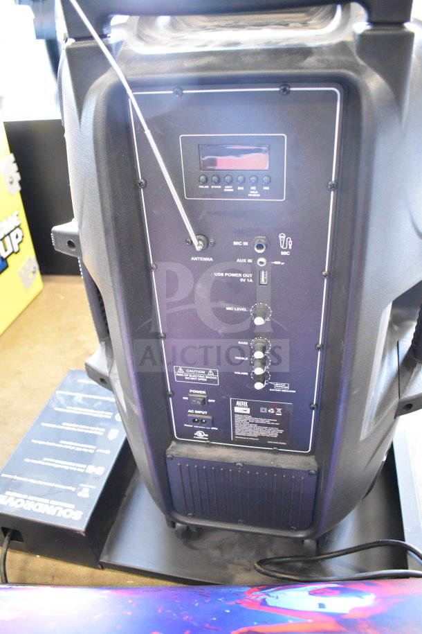 Altec Lansing IMT7002 speaker, back panel view with controls, inputs, and antenna. Good condition. Markings show USB, AUX, MIC inputs.