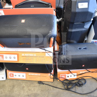 JBL Partybox 110 speakers on display, in good condition. Features include Bluetooth, mic inputs, and dynamic light show.