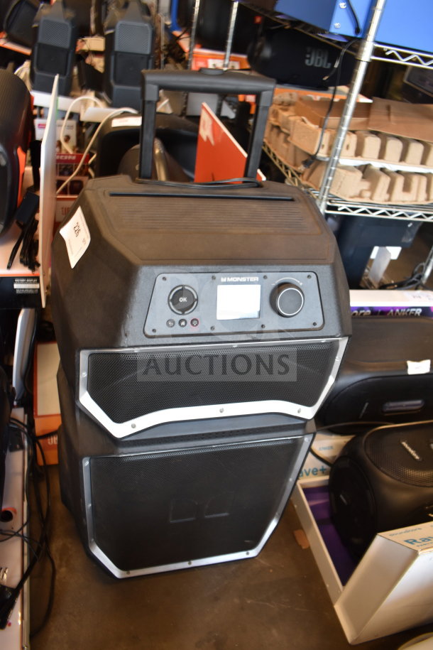 Monster MNRRX Rockin' Roller Speaker with handle, control panel, and large dual speakers, in used condition.