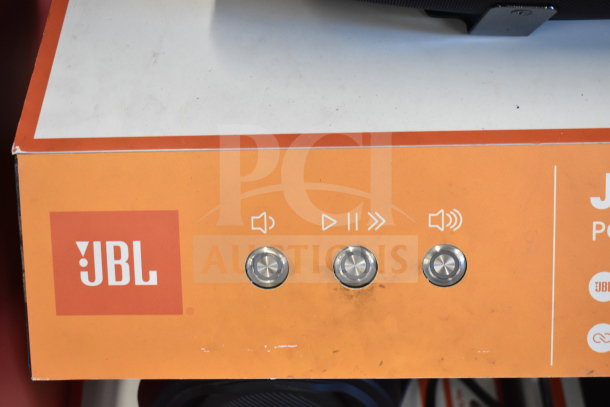 JBL Boombox 3 Speaker Store Display with control buttons and JBL logo, showcasing sleek design and interactive features.