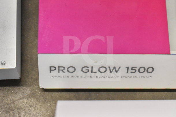 Store display showcasing Ion Pro Glow 1500 speaker, with label indicating "Complete High-Power Bluetooth Speaker System."