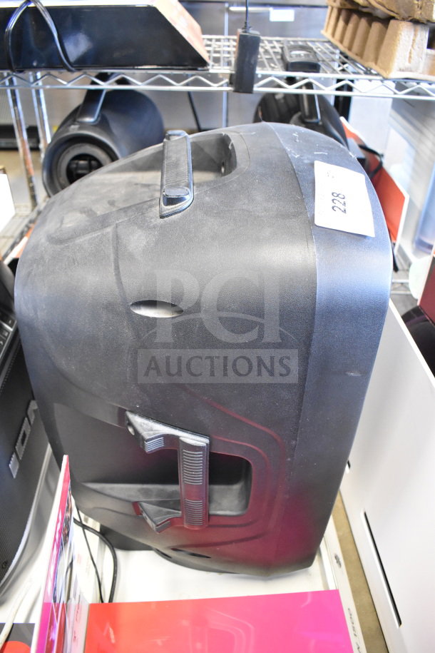 Store display featuring Ion Pro Glow 1500 Speaker in used condition, black finish, visible handle and item tag.