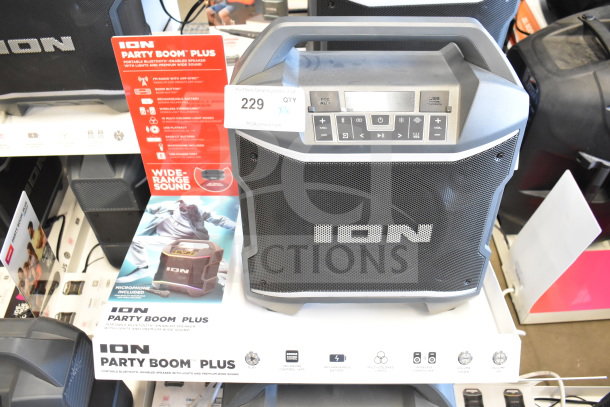 Ion Party Boom Plus speaker display, featuring Bluetooth, rechargeable battery, and multicolored lights. Includes multiple units.
