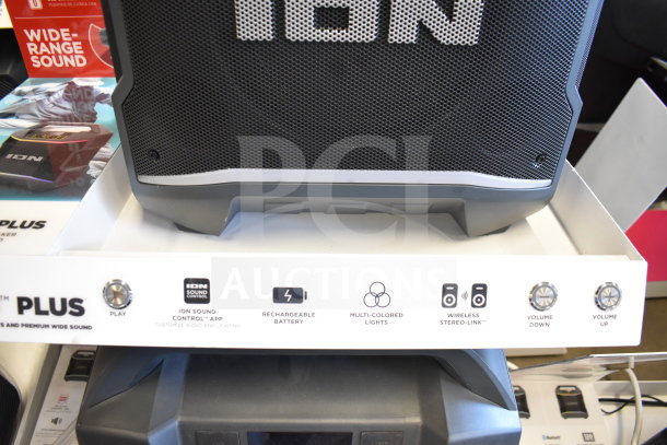 Ion Party Boom Plus Speaker display, featuring wide-range sound, rechargeable battery, multi-colored lights, and stereo link.