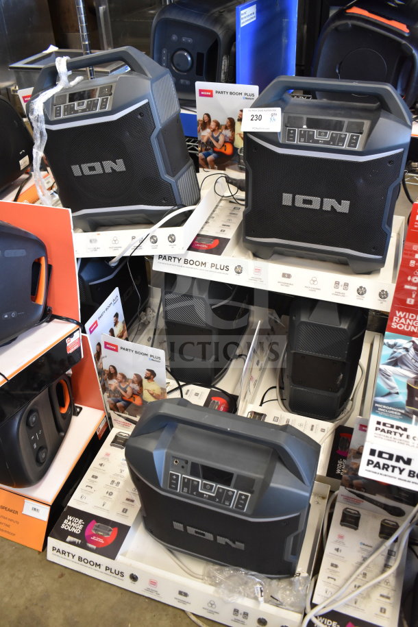 Ion Party Boom Plus speaker, store display, includes six units. Features wide-range sound, Bluetooth, and microphone input.