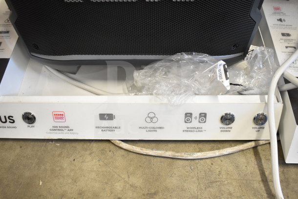 Ion Party Boom Plus speaker on display. Features rechargeable battery, multi-colored lights, and wireless stereo-link.