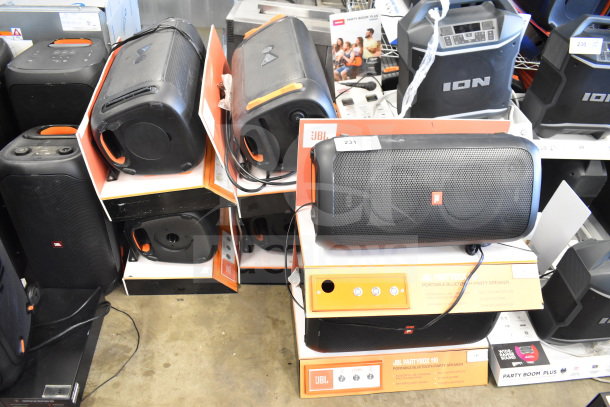 6 JBL Partybox 110 Portable Bluetooth Speakers on display, each in original packaging. Ideal for powerful party sound.